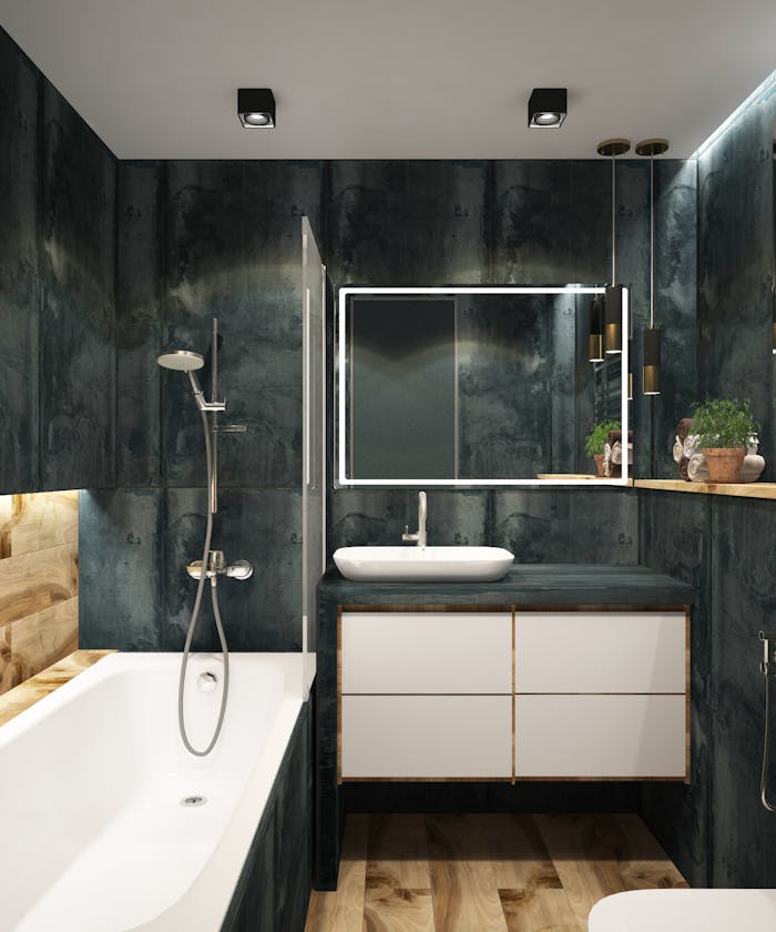 contact-img A contemporary bathroom showcasing black marble walls, clean lines, and modern fixtures, exuding luxury and style.
